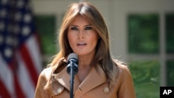 First lady Melania Trump speaks on her initiatives during an event in the Rose Garden of the White House, May 7, 2018, in Washington. 