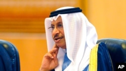 FILE - Kuwaiti Prime Minister Sheikh Jaber al-Mubarak Al Sabah talks during a meeting in Beijing, China, June 3, 2014.