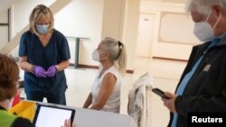 ARHIVA: Vakcinacija u Mičigenu, u SAD (Foto: REUTERS/Emily Elconin)