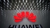 FILE - A Huawei company logo is displayed at Shenzhen International Airport, in Shenzhen, Guangdong province, China, July 22, 2019.