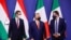 FILE - Hungary's Prime Minister Viktor Orban, Poland's Prime Minister Mateusz Morawiecki and Italy's League party leader Matteo Salvini pose for a picture after a news conference following their meeting in Budapest, Hungary, Apr. 1, 2021.