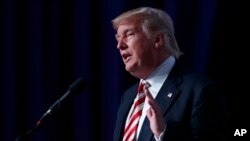 Kandidat presiden AS dari Partai Republik Donald Trump dalam sebuah acara di Washington (9/9). (AP/Evan Vucci)