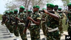 FILE - Burundian soldiers, part of the African Union troops, march at their base in Mogadishu, Somalia, on Jan. 24, 2011. The second phase of AU troop withdrawal from Somalia has started, the bloc said on Sept. 18, 2023.