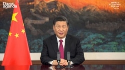 This video grab taken on Jan. 25, 2021, from the website of the World Economic Forum shows China's President Xi Jinping speaking from Pekin as he opens an all-virtual World Economic Forum, which usually takes place in Davos, Switzerland.