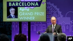 Michael Bloomberg, a billionaire and former mayor of New York, announces the winners of the Bloomberg Philanthropies' 2013-2014 Mayors Challenge. Bloomberg used his wealth to inspire cities with ideas to improve city life. (AP Photo/Christophe Ena)