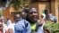 FILE - Niger journalist Moussa Kaka (C) is surrounded by supporters in Niamey, Oct. 7, 2008, after an appeals court ordered his provisional release just over a year since his detention for allegedly undermining state security. 