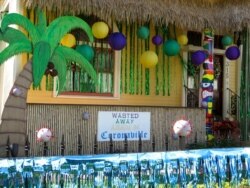 FILE - Foam balls studded with golf tees stand in for coronaviruses at this "house float" in the Algiers Point neighborhood of New Orleans, Jan. 15, 2021. All around the city, thousands of houses are being decorated as floats for Mardi Gras.