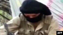 Un combattant du groupe Jund al-Khilafa 
