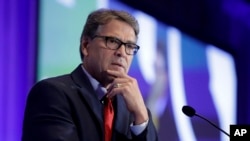 FILE - Energy Secretary Rick Perry speaks at the California GOP fall convention in Indian Wells, Calif., Sept. 6, 2019.
