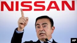 FILE - President and Chief Executive Officer of Nissan Motor Co., Carlos Ghosn speaks during a press conference in Yokohama, near Tokyo, May 11, 2012.