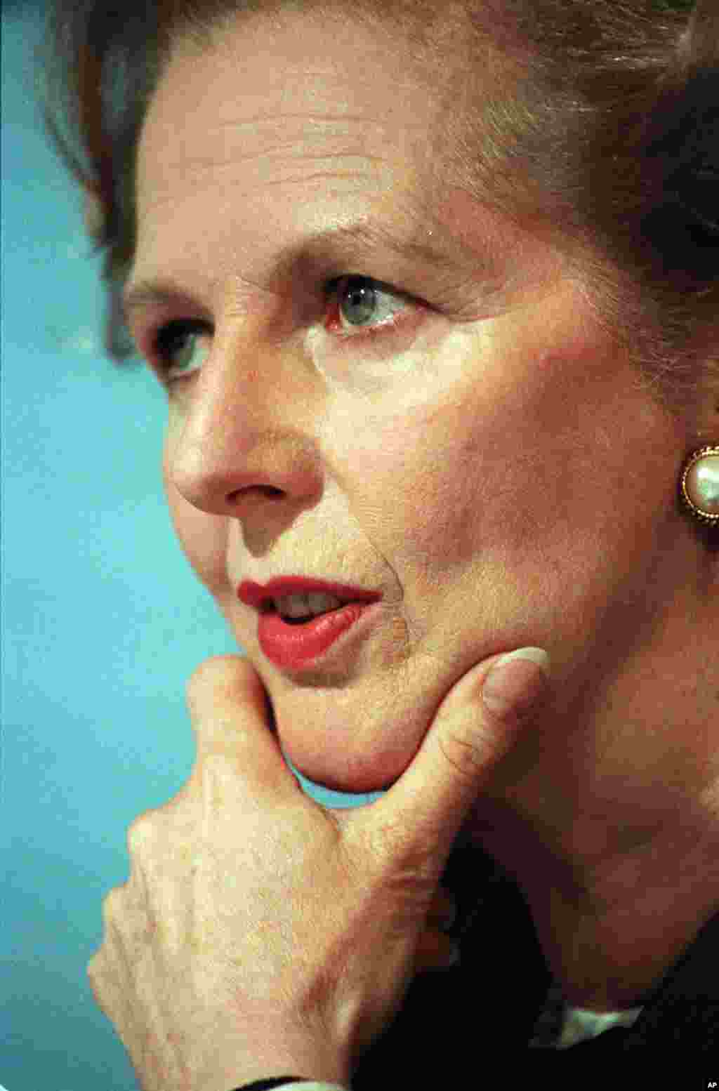 Then Prime Minister Margaret Thatcher took a moment for thought during a press conference in central London, June 10, 1987.
