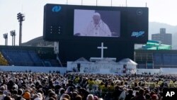 Pope Francis celebrates a Mass at Nagasaki Prefectural Baseball Stadium, Sunday, Nov. 24, 2019, in Nagasaki, Japan. 