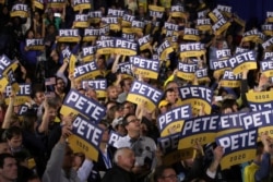 Supporters of Democratic presidential candidate former South Bend, Ind., Mayor Pete Buttigieg cheer during a primary night election rally in Nashua, N.H., Feb. 11, 2020.