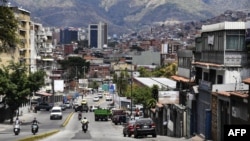 A view of Petare neighborhood in Caracas where people try to return to normal life after severe power cuts affected the country on March 13, 2019.