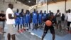 Olumide Oyedeji, a former NBA player, works with young players at the skills development station of the National Basketball Association's first training academy in Thies, east of Dakar, Senegal, May 2, 2017.