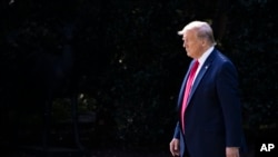 FILE - President Donald Trump walks from the Oval Office as he leaves the White House, Sept. 16, 2019, in Washington.