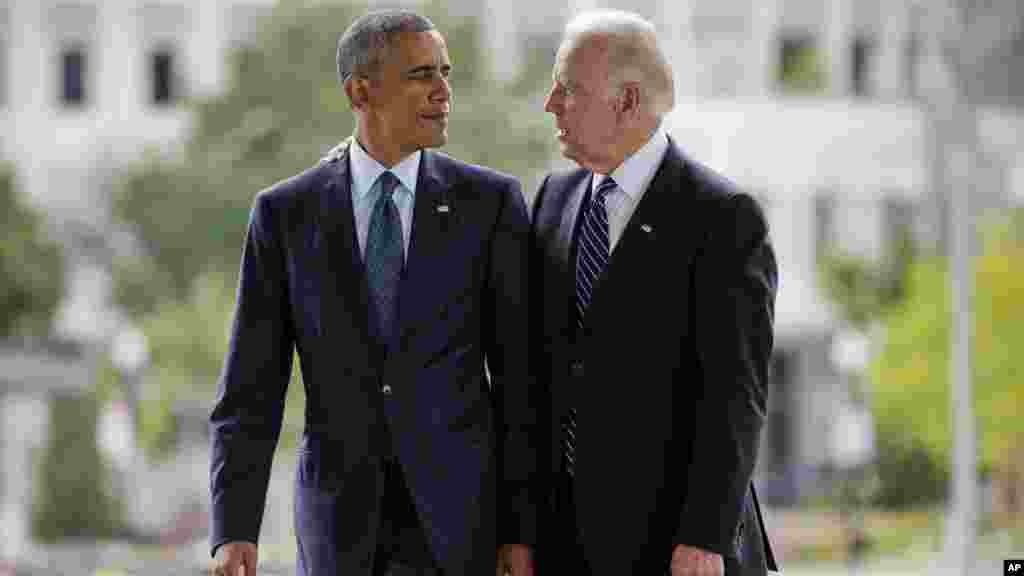 Le président Barack Obama avec le vice-président Joe Biden parlent aux membres des médias lors de leur visite à orlando, le jeudi 16 juin, 2016.