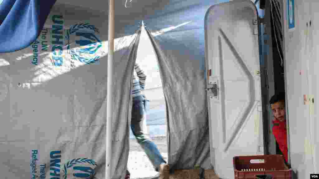 Around 800 people live in Souda, which was previously a transit camp people stayed in briefly before moving on to the Greek mainland. (J. Owens for VOA)