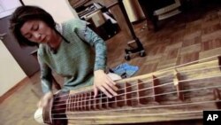 Composer Jin Hi Kim blends traditional Korean komungo styles with Western music.
