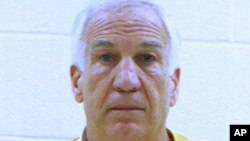 In this booking photo released early Saturday morning June 23, 2012 by the Centre County Correctional Facility in Bellefonte, Pa., former Penn State University assistant football coach Jerry Sandusky is shown.