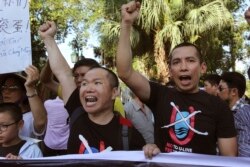 រូប​ឯកសារ៖ បាតុករ​វៀតណាម​ស្រែក​ពាក្យស្លោក​ប្រឆាំង​ចិន​នៅ​ក្នុង​ក្រុង​ហាណូយ កាលពី​ថ្ងៃទី១៩ ខែកក្កដា ឆ្នាំ២០១៤។