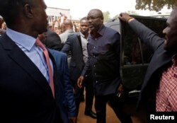 FILE - George Weah, former soccer player and presidential candidate of Coalition for Democratic Change (CDC), arrives at his party's headquarters in Monrovia, Liberia, Dec. 27, 2017.