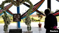 South Sudan's President Salva Kiir prays at the John Garang Memorial during events marking the third anniversary of South Sudan's independence in Juba, July 9, 2014. 
