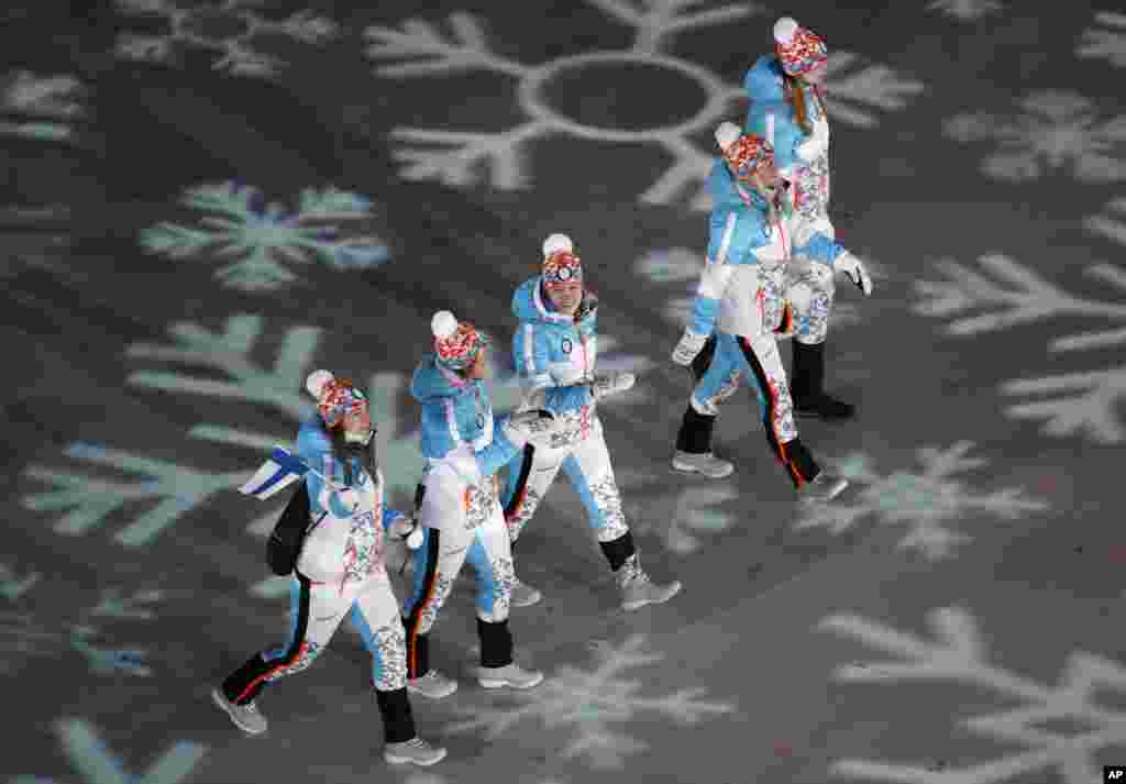 Finnish athletes enter the stadium during the closing ceremony of the 2018 Winter Olympics in Pyeongchang, South Korea, Sunday, Feb. 25, 2018.