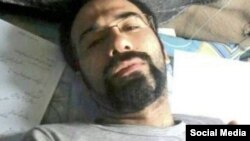 Iranian citizen-journalist Soheil Arabi, seen in an undated photo from prison in Iran.
