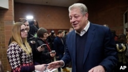 Former U.S. Vice President Al Gore talks to reporters at the premiere of "An Inconvenient Sequel: Truth to Power" at the Eccles Theater during the 2017 Sundance Film Festival in Park City, Utah, Jan. 19, 2017.