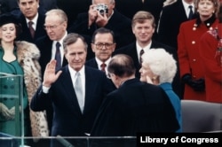 FILE - Bush being sworn-in as president in 1989. (Library of Congress)