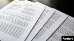 Laporan akhir Jaksa Khusus Robert Mueller tentang intervensi Rusia dalam pilpres AS 2016, di Washington, 24 Maret 2019. (Foto: Jim Bourg/Reuters)