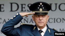 FILE - Mexico's former Defense Minister General Salvador Cienfuegos attends an event at a military zone in Mexico City, Mexico, Sept. 2, 2016. 