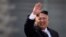 FILE - North Korean leader Kim Jong Un waves during a military parade in Pyongyang, North Korea, to celebrate the 105th birth anniversary of Kim Il Sung, the country's late founder and grandfather of current ruler Kim Jong Un, April 15, 2017.