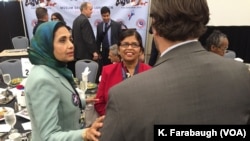 Sarwat Husain (left, in green jacket) at the AMDC Luncheon at the Pennsylvania Convention Center during the Democratic National Convention.