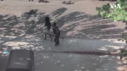 Myanmar Police Officer Forcing Resident to Crawl on All Fours