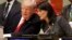 President Donald Trump speaks with U.S. Ambassador to the United Nations Nikki Haley before a meeting during at the United Nations, Sept. 18, 2017. 