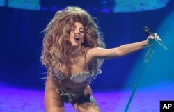 Lady Gaga performs on stage at the Roundhouse in Camden, north London, as part of the iTunes Festival, Sept 1, 2013, the first of 30 nights of live free music in the capital.