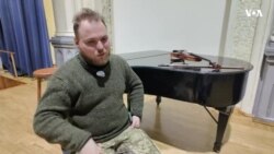 Ukraynada skripkasıyla cəbhədə döyüşən musiqiçi