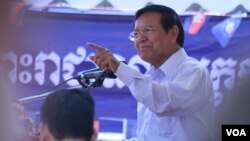Long exposure picture shows driving cars on the highway just before sunrise near Frankfurt, central Germany.