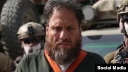 امنیت ملی افغانستان این فرد را اسلم فاروقی معرفی کرده است