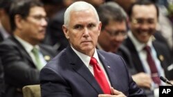 U.S. Vice President Mike Pence attends the 13th East Asian Summit Plenary on the sidelines of the 33rd ASEAN summit in Singapore, Nov. 15, 2018.