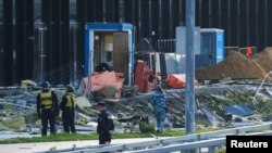 Uviđaj posle napada za koji se veruje da je počinjen ukrajinskim dronom (Foto: REUTERS/Maxim Shemetov)