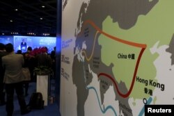 A map illustrating China's silk road economic belt and the 21st century maritime silk road, or the so-called "One Belt, One Road" megaproject, is displayed at the Asian Financial Forum in Hong Kong, China, Jan. 18, 2016.
