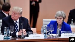 Le président américain Donald Trump et la Première ministre britannique Theresay May au G20, Hambourg, Allemagne, le 7 juillet 2017
