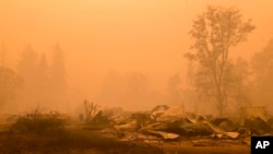 FILE - Fire damage is seen in Mill City, Ore., Sept. 12, 2020. An Oregon jury awarded $85 million Tuesday, Jan. 23, 2024, to nine victims of wildfires that ravaged the state in 2020, in the latest trial faced by utility PacifiCorp over its liability in the deadly blazes. 