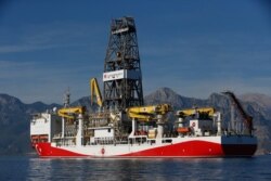 FILE - Turkey's new oil and gas drillship "Conquerer" is seen off the coast of Antalya, southern Turkey, Oct. 30, 2018.