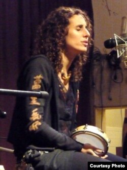 Basya Schechter grew up in an orthodox home but now incorporates World Music in her cantorial work and in her band "Pharaoh's Daughter." (Photo Credit: Mimi Klein)