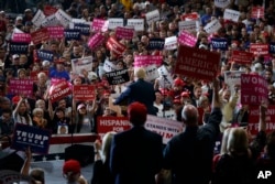 Republican presidential candidate, Donald Trump, speaks during a campaign rally, Nov. 5, 2016, in Denver.
