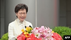 This July 8, 2020 handout photo shows Hong Kong's Chief Executive Carrie Lam speaking at a ceremony for the opening of the new "Office for Safeguarding National Security of the Central People's Government" in Hong Kong.